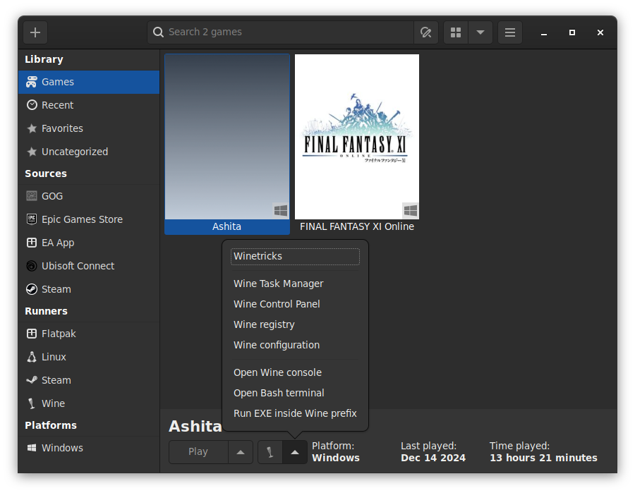 Lutris window open with Ashita program selected and the configuration menu next to the wine bottle open.